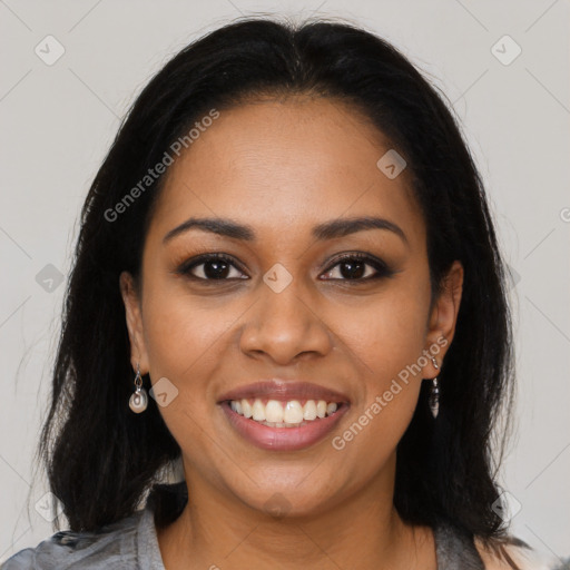 Joyful latino young-adult female with long  black hair and brown eyes