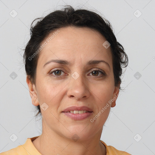 Joyful white adult female with short  brown hair and brown eyes