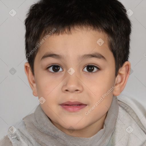 Joyful white child male with short  brown hair and brown eyes