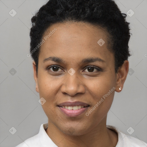 Joyful black young-adult female with short  black hair and brown eyes