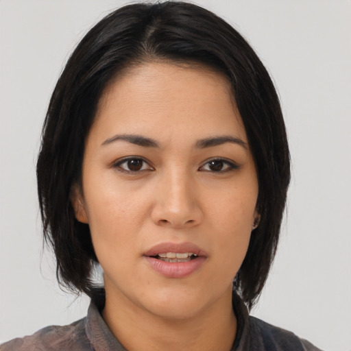 Neutral asian young-adult female with medium  black hair and brown eyes