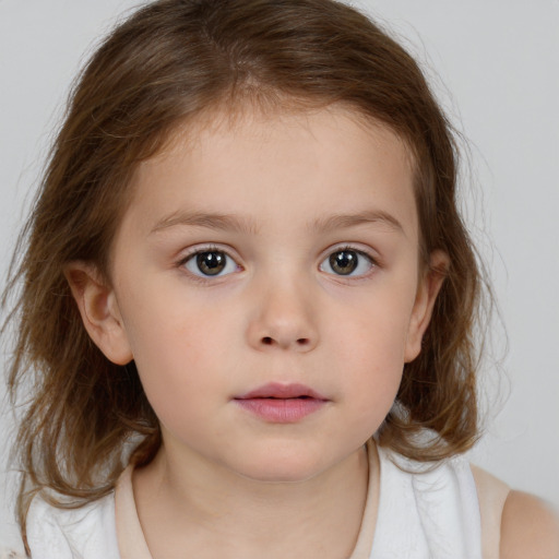 Neutral white child female with medium  brown hair and brown eyes