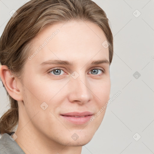 Joyful white young-adult female with medium  brown hair and blue eyes