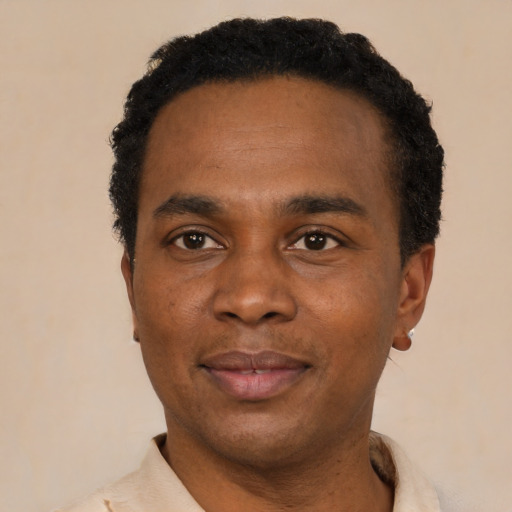 Neutral black adult male with short  black hair and brown eyes