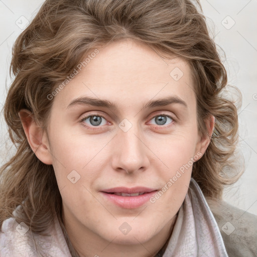 Joyful white young-adult female with long  brown hair and blue eyes