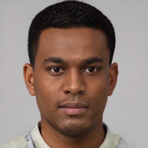 Neutral black young-adult male with short  black hair and brown eyes