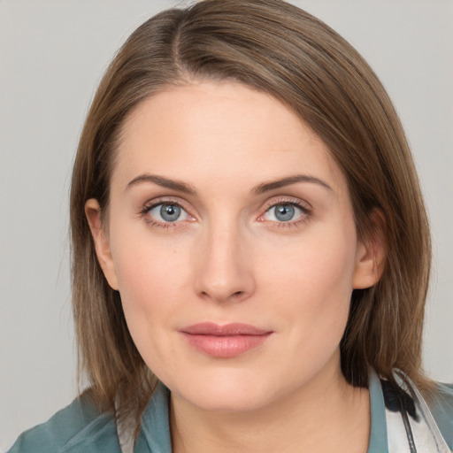 Neutral white young-adult female with medium  brown hair and grey eyes