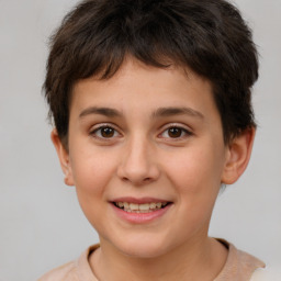 Joyful white child male with short  brown hair and brown eyes