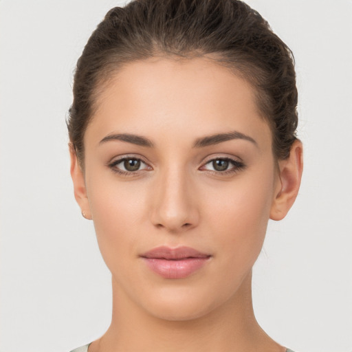 Neutral white young-adult female with short  brown hair and brown eyes