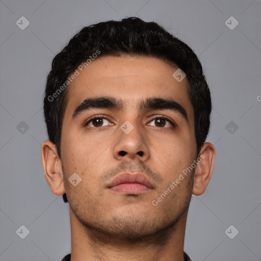 Neutral latino young-adult male with short  black hair and brown eyes