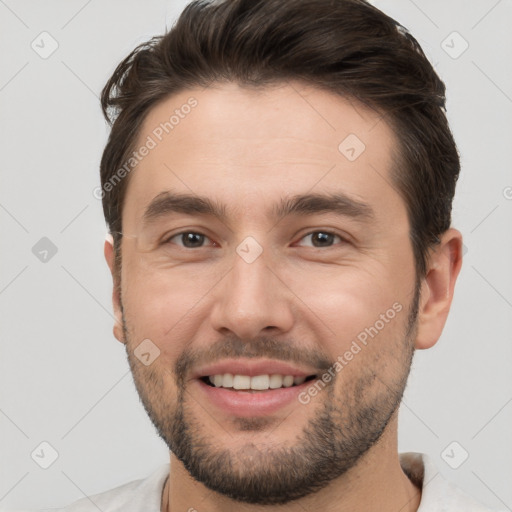 Joyful white young-adult male with short  brown hair and brown eyes