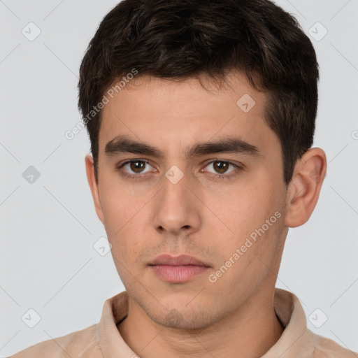 Neutral white young-adult male with short  brown hair and brown eyes