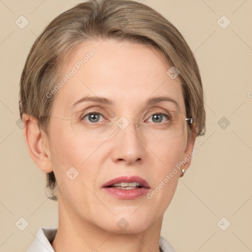 Joyful white adult female with short  brown hair and grey eyes