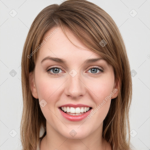 Joyful white young-adult female with long  brown hair and green eyes