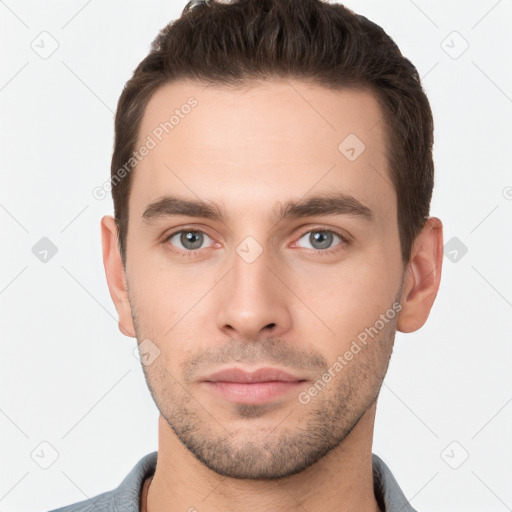 Neutral white young-adult male with short  brown hair and brown eyes