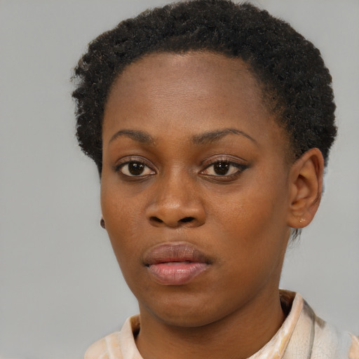 Neutral black young-adult female with short  brown hair and brown eyes
