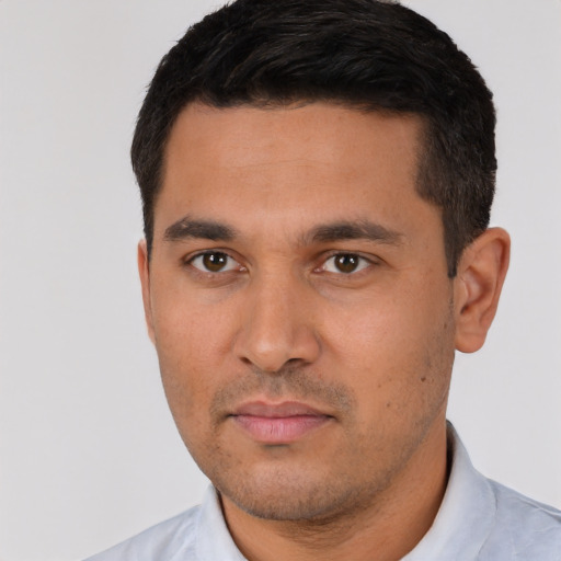 Neutral white young-adult male with short  black hair and brown eyes