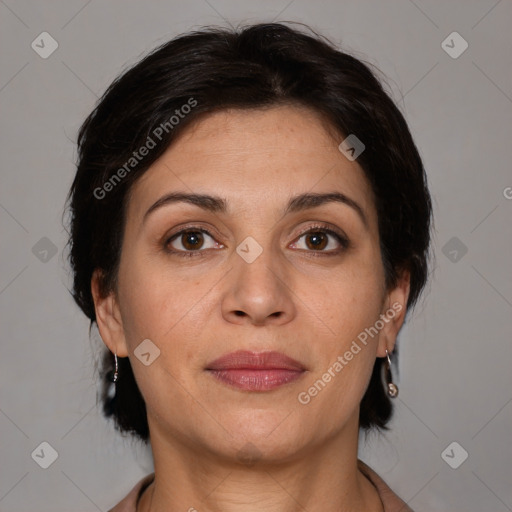 Joyful white adult female with medium  brown hair and brown eyes