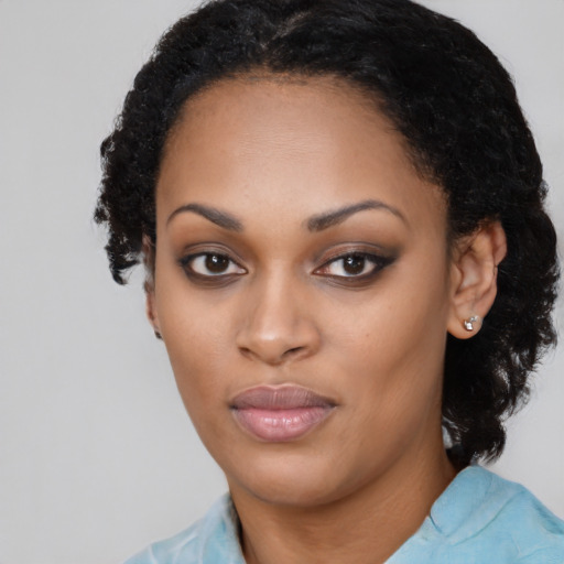 Neutral black young-adult female with long  black hair and brown eyes