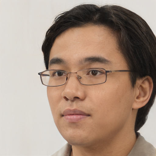Neutral asian young-adult male with short  brown hair and brown eyes