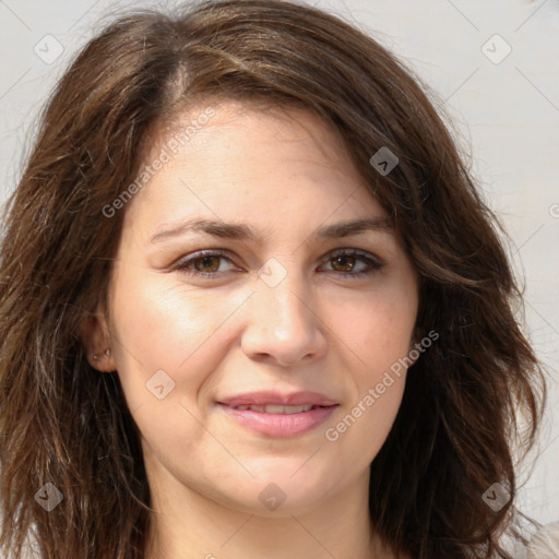 Joyful white adult female with long  brown hair and brown eyes