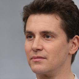 Neutral white adult male with short  brown hair and brown eyes