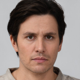 Neutral white adult male with short  brown hair and brown eyes