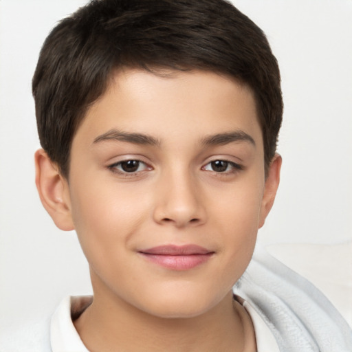 Joyful white child male with short  brown hair and brown eyes