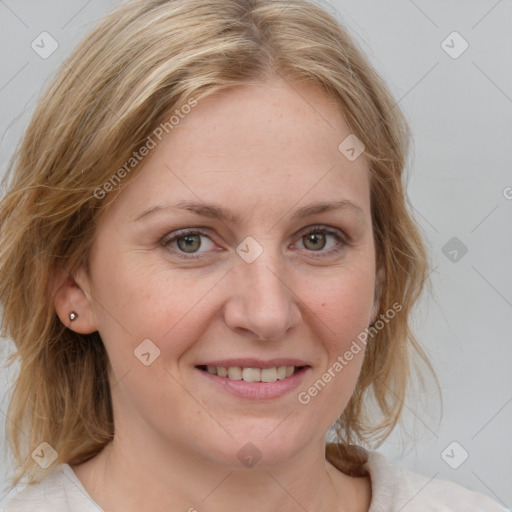 Joyful white young-adult female with medium  brown hair and blue eyes