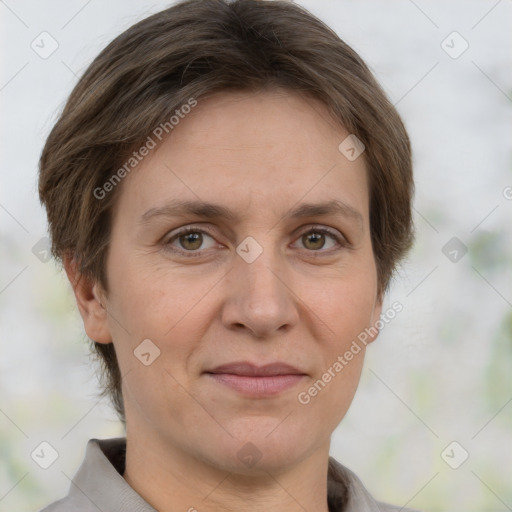 Joyful white adult female with short  brown hair and grey eyes