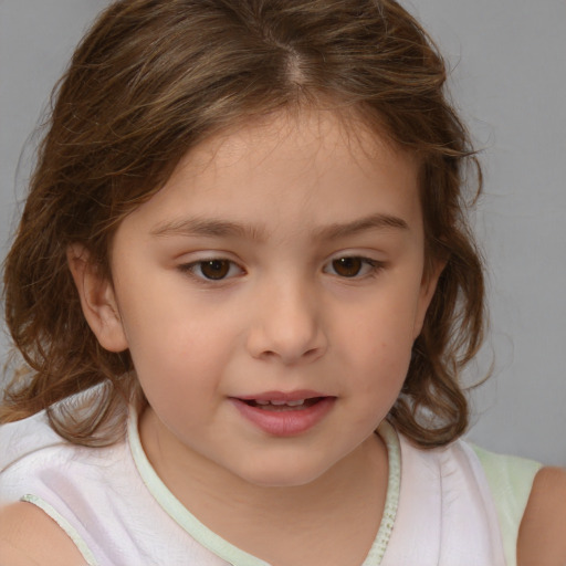 Joyful white child female with medium  brown hair and brown eyes