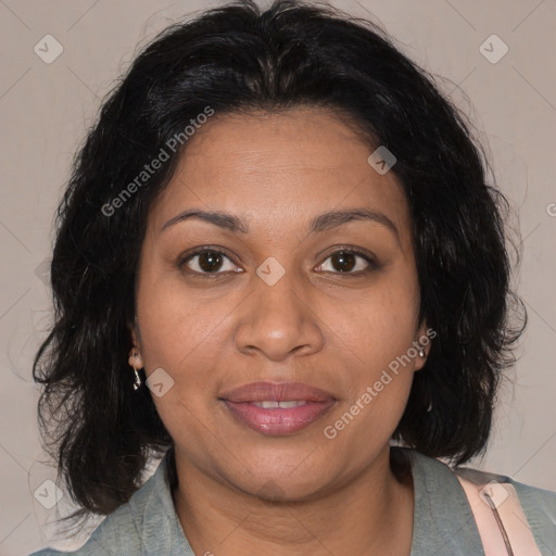 Joyful black adult female with medium  brown hair and brown eyes
