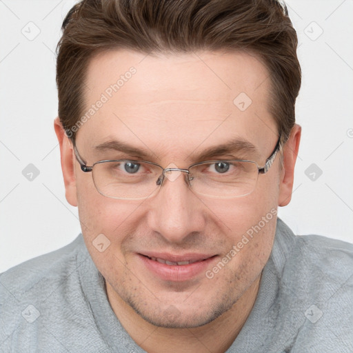 Joyful white adult male with short  brown hair and grey eyes