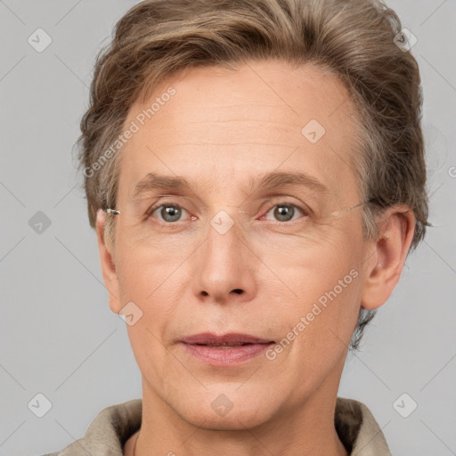 Joyful white adult male with short  brown hair and grey eyes