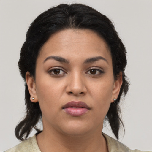 Neutral latino young-adult female with medium  brown hair and brown eyes