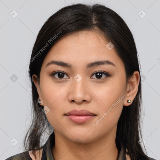 Joyful asian young-adult female with long  brown hair and brown eyes