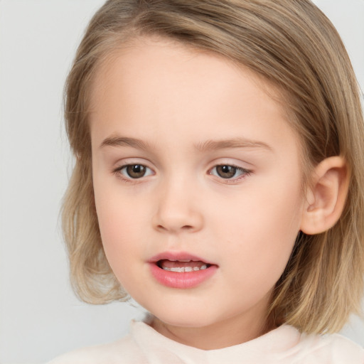 Neutral white child female with long  brown hair and brown eyes