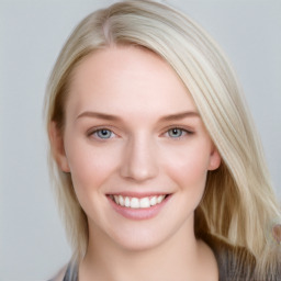 Joyful white young-adult female with long  brown hair and blue eyes