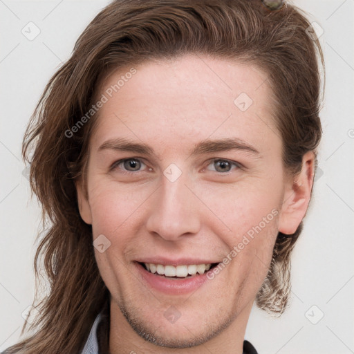 Joyful white young-adult female with long  brown hair and grey eyes