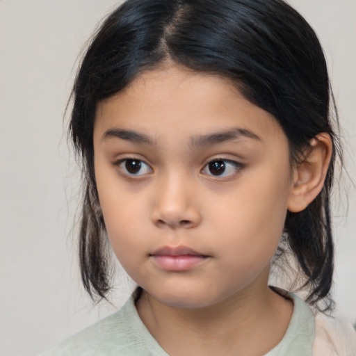 Neutral asian child female with medium  brown hair and brown eyes