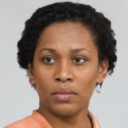 Neutral black young-adult female with short  brown hair and brown eyes