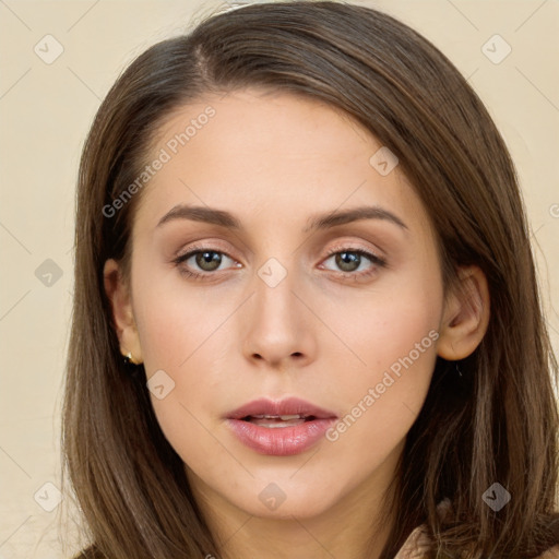 Neutral white young-adult female with long  brown hair and brown eyes