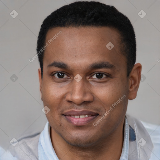 Joyful latino young-adult male with short  brown hair and brown eyes