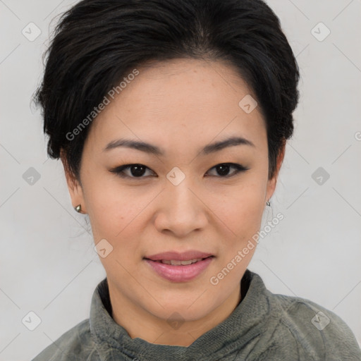 Joyful asian young-adult female with short  brown hair and brown eyes