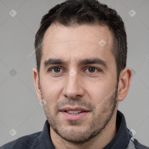 Joyful white young-adult male with short  black hair and brown eyes