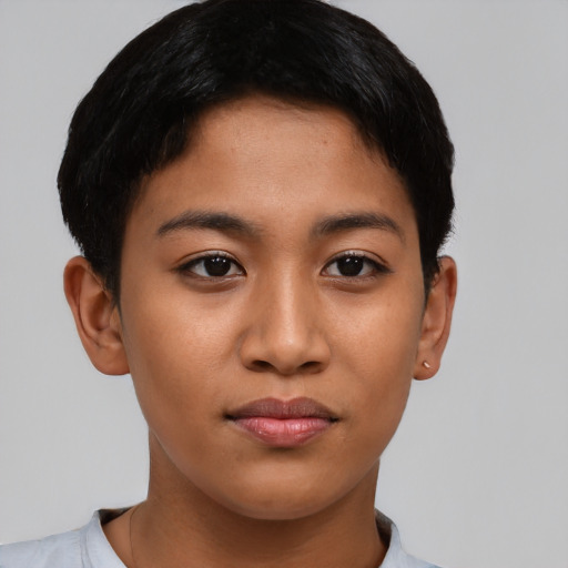 Joyful asian young-adult female with short  black hair and brown eyes
