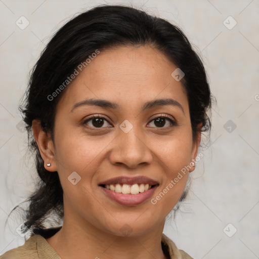 Joyful latino young-adult female with medium  brown hair and brown eyes