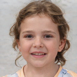 Joyful white child female with medium  brown hair and brown eyes