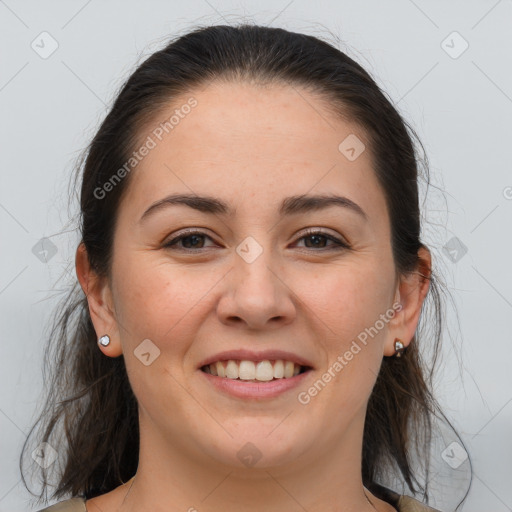 Joyful white young-adult female with medium  brown hair and brown eyes