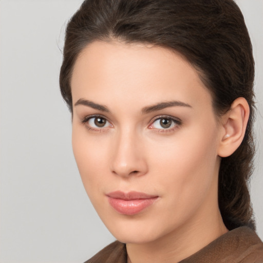 Neutral white young-adult female with medium  brown hair and brown eyes